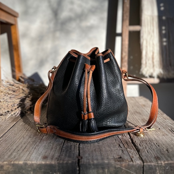 Dooney & Bourke Handbags - 80's DOONEY & BOURKE DARK NAVY BLUE LEATHER TASSELED DRAWSTRING BUCKET BAG